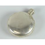 Small silver circular hip flask with screw top, rubbed hallmarks, 3 troy oz approx. Condition