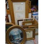 A box of various framed prints and pictures including Paddington Bear ETC Condition reports provided