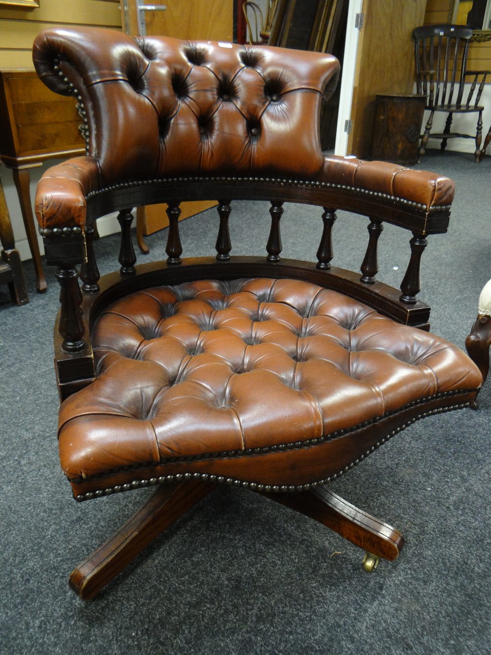 Twentieth century leather button back captain's swivel office chair Condition reports provided on