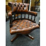 Twentieth century leather button back captain's swivel office chair Condition reports provided on