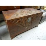 An Oriental carved camphorwood chest Condition reports provided on request by email for this auction