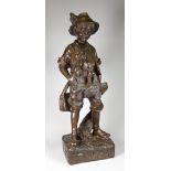 AFTER AUGUST MOREAU bronze figure - the poacher of a young boy carrying prey on naturalistic base,