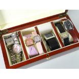 A modern jewellery casket containing various ladies wristwatches Condition reports provided on