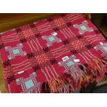 A good traditional Welsh wool blanket in pink ground with black yellow duck egg blue and flecked