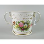 A Staffordshire porcelain (possibly Coalport) loving cup to commemorate Rev. Hugh Pugh of Mostyn (