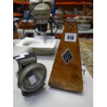 A vintage metronome and a Lucas Silver King carbide motoring lamp Condition reports provided on