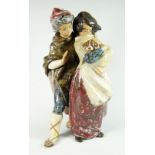 A Lladro pottery group of two children and puppy braving the elements, 34cms high Condition