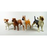 Group of four china dogs to include three Beswick (4) Condition reports provided on request by email