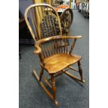 Elm seated spindle back rocking chair Condition reports provided on request by email for this