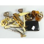 An interesting parcel of collectables including ivory cigar cutter in the form of a champagne