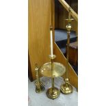 A brass circular base standard lamp with wine table column together with a circular based Corinthian