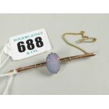 A 9ct yellow gold bar brooch set with oval opal veneer and with safety chain Condition reports