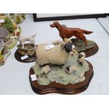 Two Country Artists sculptures of hunting dogs and a Border Fine Arts sculpture of a black headed