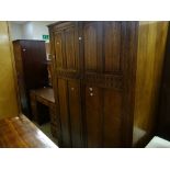 A good vintage linen-fold double wardrobe with matching dressing table Condition reports provided on