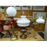 Three vintage / antique oil lamps comprising stepped square based example with Corinthian column and