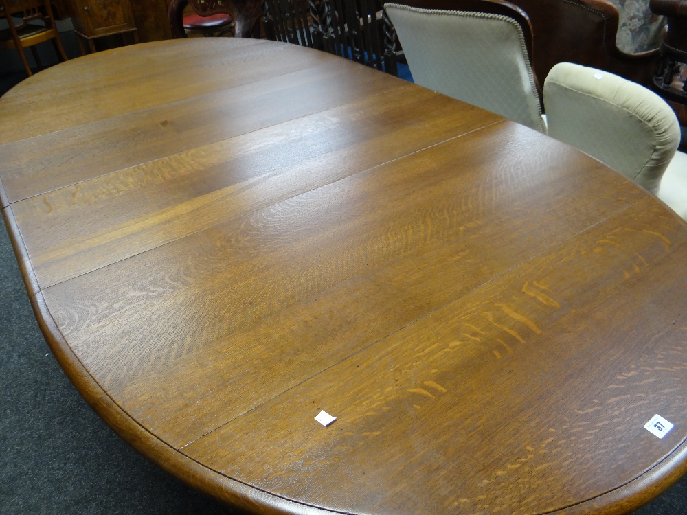 Twentieth century oak extending D-ended dining table having two lift out additional leaves, fretwork - Image 2 of 3