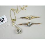 Two aquamarine set bar brooches in 9ct & 15ct yellow gold and an aquamarine / quartz pendant and