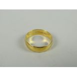 A 22ct yellow gold wedding band, 4grams Condition reports provided on request by email for this