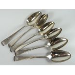 A loose set of six Georgian silver serving spoons with monogrammed terminals, London 1817, 11oz