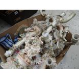 Collection of mainly decorative continental cherub and flower decorated candelabra (with damage),