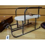 A charming wooden and iron model of a sleigh, 38cms long (possibly American) together with a