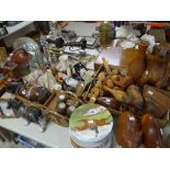 A very large parcel of mixed items including modern wooden carved ornaments, pottery and china
