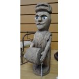 An interesting carved figure of a standing drummer, believed to be American folk-art possibly