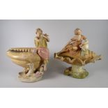 A pair of Royal Dux pottery ornaments each of typical form with classical-type figures resting on