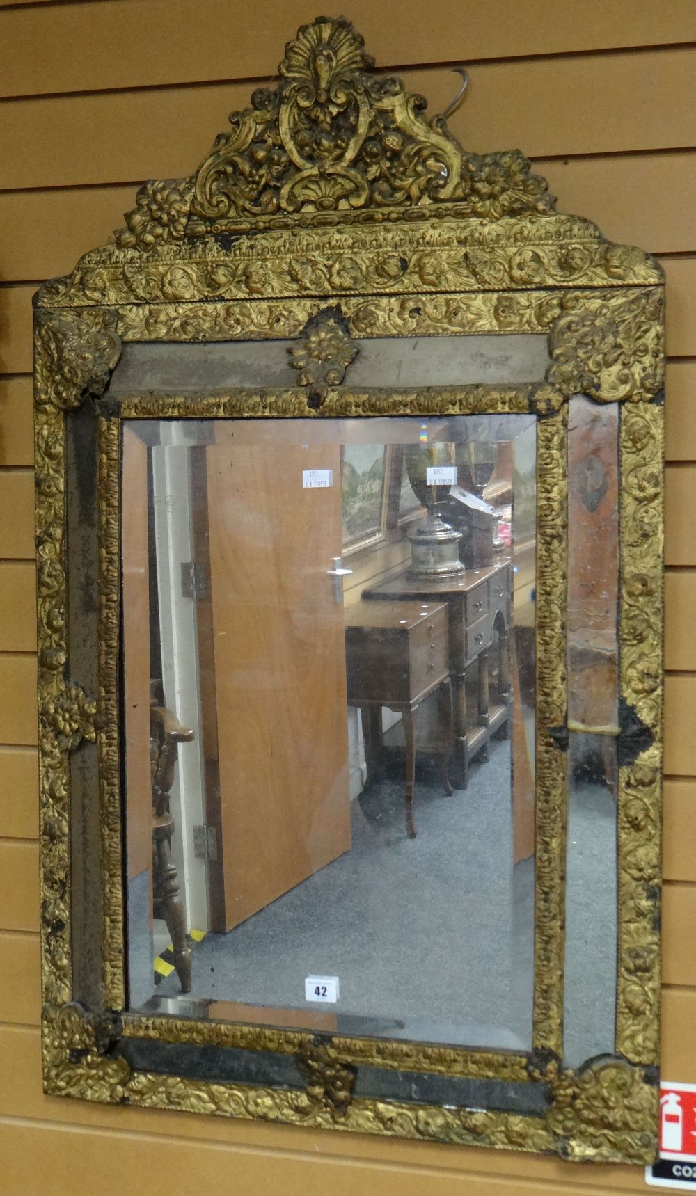 Antique gilt metal framed bevel plated hanging wall mirror having central rectangular mirror plate