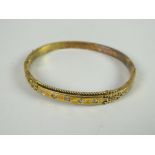 15ct gold five-stone diamond chip bangle, 9.8grams approx. Condition reports provided on request