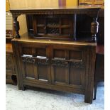 A reproduction Jacobean-style carved oak court cupboard, 125cms wide Condition reports provided on