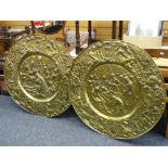 A pair of interesting, believed nineteenth century, repousse brass plaques commemorating Charles I