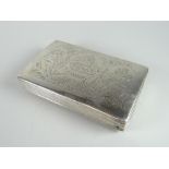 White metal rectangular engraved tobacco box, engraved to the top with two figures amongst scroll