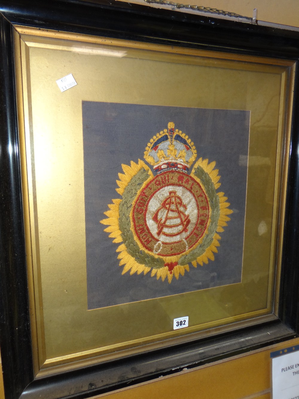 A framed regimental embroidery crest, 34 x 31cms Condition reports provided on request by email