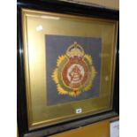 A framed regimental embroidery crest, 34 x 31cms Condition reports provided on request by email