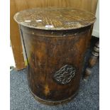 Cylindrical lift top grain / bin or laundry basket with scrumbled finish and flower head crest