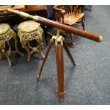 A wooden and brass reproduction telescope and tripod Condition reports provided on request by