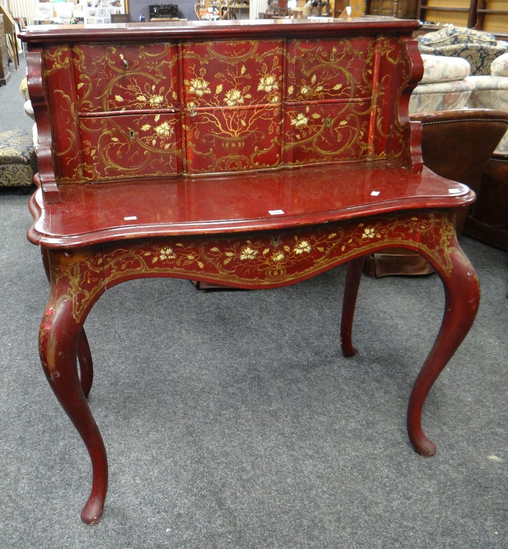 Twentieth century lacquered dressing table having serpentine front with blind panelled drawers