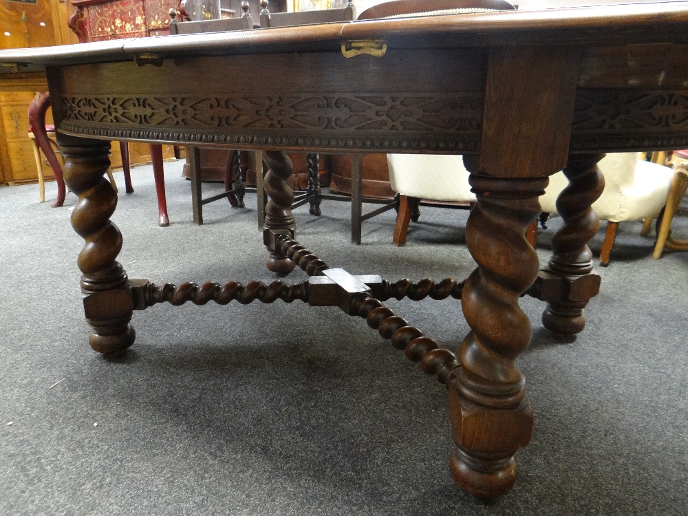 Twentieth century oak extending D-ended dining table having two lift out additional leaves, fretwork - Image 3 of 3