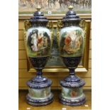 Pair of Royal Austria Vienna twin-handled vases and covers on cylindrical pedestal bases, hand