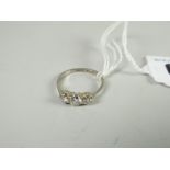 18ct white gold and platinum three-stone diamond ring, 2.1grams approx. Condition reports provided