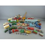 Good collection of vintage diecast vehicles and figures etc, mainly Dinky, most play worn but in