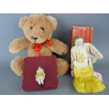 Two small vintage bisque headed dolls and a small modern teddy bear