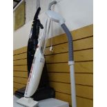 Upright Electrolux vacuum cleaner, Bissell Magicbroom and modern standard lamp E/T