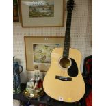 Squire fender model no. 093-0300-021 acoustic guitar on a stand