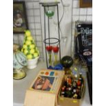 Two modern metalware and glass displays, a collection of drinks miniatures, a boxed casserole dish