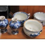 Vintage chamber pots and a pair of blue and white bulbous vases
