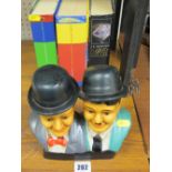Novelty Laurel & Hardy figures and a collection of Harry Potter books
