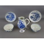 Circa 1770 Worcester blue and white sparrow beak jug and two tea bowls with saucers, all fence