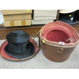 Vintage leather hat box and top hat made by Cuthbertson of London